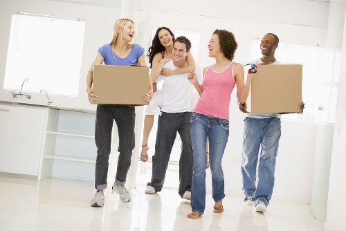 House movers loading furniture in a Bexley residential street