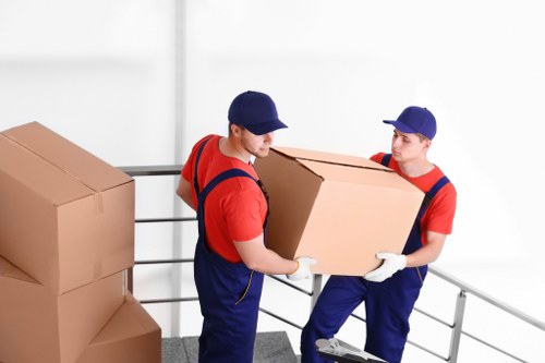 Local house removals support in Bexley with moving van and packed boxes