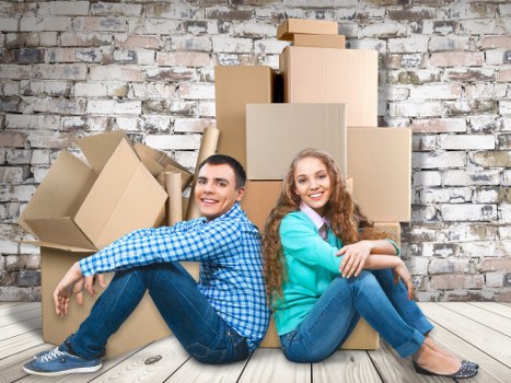 Household items being loaded with a transparent removal quote in view