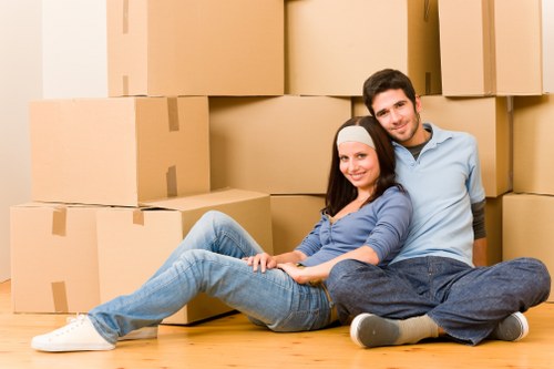 Moving boxes and furniture being transported by van